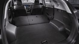 Hyundai Tucson III (2016) - wersja amerykańska - tylna kanapa złożona, widok z bagażnika