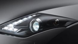 Renault Laguna III Coupe 2012 - lewy przedni reflektor - włączony