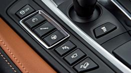 BMW X6 II M (2015) - przyciski na tunelu środkowym
