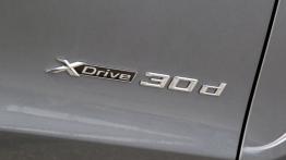 BMW X5 III (2014) xDrive30d - wersja amerykańska - emblemat boczny