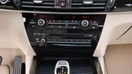 BMW X5 III (2014) xDrive30d - wersja amerykańska - konsola środkowa