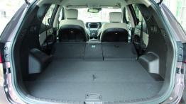 Hyundai Santa Fe III - wersja europejska - tylna kanapa złożona, widok z bagażnika