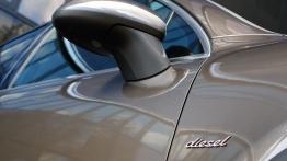Porsche Cayenne III SUV 3.0 Diesel 245KM - galeria redakcyjna - emblemat boczny