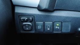 Toyota Auris II Touring Sports - galeria redakcyjna - panel sterowania pod kierownicą