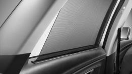 Seat Leon III ST (2014) - roleta przeciwsłoneczna w drzwiach