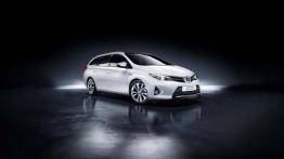 Toyota Auris II Hybrid Touring Sports (2013) - przód - reflektory włączone