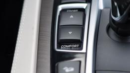 BMW Seria 7 F01 Sedan Facelifting 740d 313KM - galeria redakcyjna - tunel środkowy między fotelami