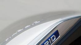 Lexus RX 450h F Sport - emblemat boczny