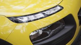 Citroen C4 Cactus 1.2 PureTech 82KM - galeria redakcyjna - prawy przedni reflektor - wyłączony