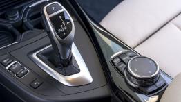 BMW 120d xDrive F20 Facelifting (2015) - tunel środkowy między fotelami