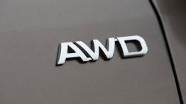 Kia Sportage III Facelifting (2014) - emblemat boczny