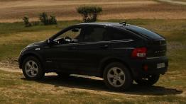 Ssangyong Actyon 2009 - lewy bok