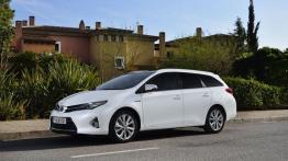 Toyota Auris II Hybrid Touring Sports (2013) - lewy bok