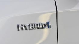 Toyota Auris II Hybrid Touring Sports (2013) - emblemat boczny