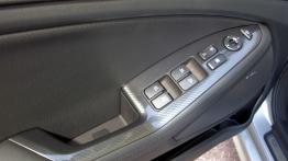 Kia Optima 2012 - sterowanie w drzwiach
