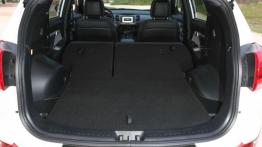 Kia Sportage III Facelifting (2014) CRDi 16V - tylna kanapa złożona, widok z bagażnika