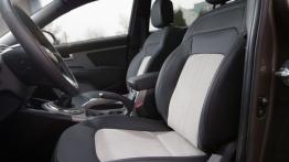 Kia Sportage III Facelifting (2014) - widok ogólny wnętrza z przodu