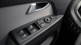 Kia Sportage III Facelifting (2014) - sterowanie w drzwiach