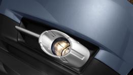 Mitsubishi Colt 2009 - lewy przedni reflektor - włączony