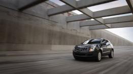 Cadillac SRX 2011 - przód - reflektory włączone