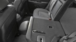 Kia Sportage SX 2011 - tylna kanapa złożona, widok z boku