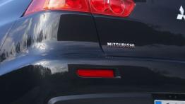 Mitsubishi Lancer Evo 2011 - lewy tylny reflektor - wyłączony