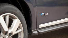 Nissan Pathfinder IV Hybrid (2014) - emblemat boczny