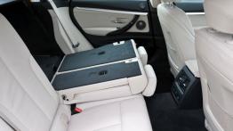 BMW 320d Gran Turismo (2014) - tylna kanapa złożona, widok z boku