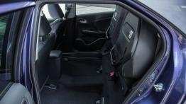 Honda Civic IX Tourer (2014) - tylna kanapa złożona, widok z boku