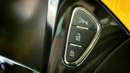 Opel Adam 1.4 100KM - galeria redakcyjna (2) - przyciski na konsoli środkowej