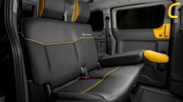 Nissan e-NV200 Barcelona Taxi (2014) - tylna kanapa złożona, widok z boku