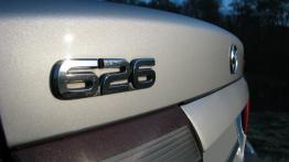 Mazda 626 V Sedan - galeria społeczności - emblemat
