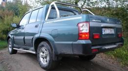 Ssangyong Musso Sport - lewy bok