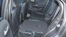 Honda Civic IX Tourer - galeria redakcyjna - tylna kanapa złożona, widok z boku