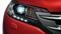 Honda CR-V IV - wersja europejska - prawy przedni reflektor - włączony
