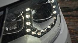 Volkswagen Tiguan SUV Facelifting 1.4 TSI BlueMotion 160KM - galeria redakcyjna - lewy przedni refle