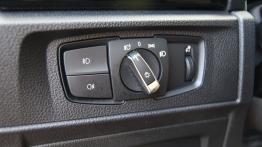 BMW Seria 1 F21 Hatchback 3d 114i 102KM - galeria redakcyjna - panel sterowania pod kierownicą