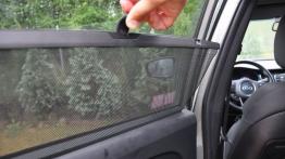 Kia Carens IV 1.6 GDI 135KM - galeria redakcyjna - roleta przeciwsłoneczna w drzwiach