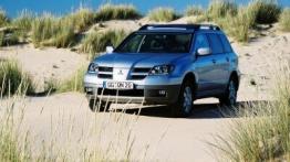 Mitsubishi Outlander - lewy bok