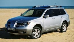 Mitsubishi Outlander - lewy bok