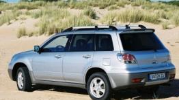 Mitsubishi Outlander - lewy bok