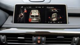 BMW X5 III (2014) xDrive50i - wersja amerykańska - ekran systemu multimedialnego