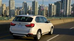 BMW X5 III (2014) xDrive50i - wersja amerykańska - widok z tyłu