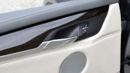 BMW X5 III (2014) xDrive30d - wersja amerykańska - drzwi kierowcy od wewnątrz