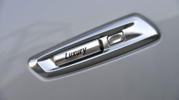 BMW serii 5 F10 Facelifting (2014) - emblemat boczny