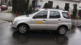 Suzuki Ignis 1.3 16V 2 WD - lewy bok
