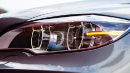 BMW X5 E70 M SUV 4.4 V8 555KM - galeria redakcyjna - lewy przedni reflektor - włączony