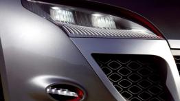 Renault Megane Coupe Concept - prawy przedni reflektor - włączony